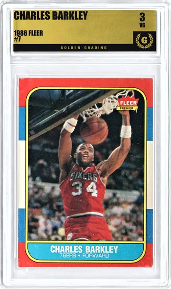 Front of a 1986 Fleer Charles Barkley #7 card in a Golden Grading holder, graded 3 Very Good, serial 307099